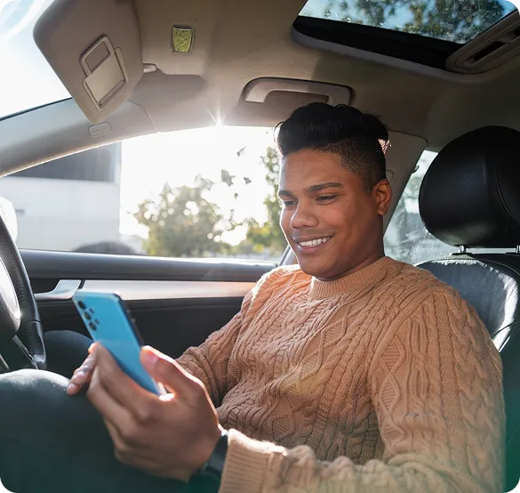 Rider working in car